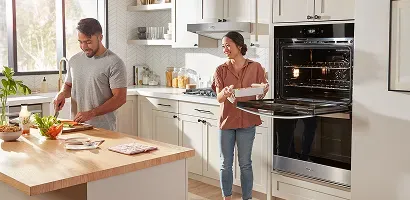whirlpool-double-oven-couple-cooking